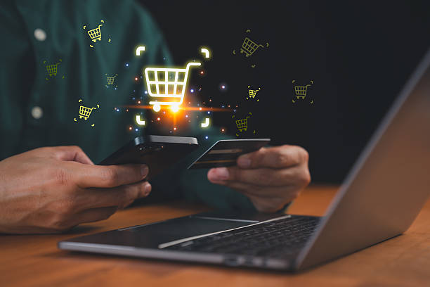 istock Customer using smartphone and credit card with digital shopping cart icon, symbolizing e-commerce, mobile payment, and online retail business. Concept of digital marketing, internet shopping. 2254985157