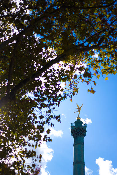 istock Paris, France: Top of Bastille Monument, Tree in Foreground, 11th 2254986602