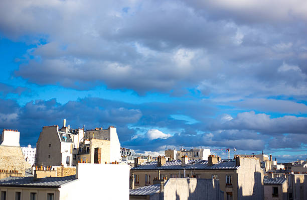 Paris, France: Sunny Rooftops/Skyline Puffy Clouds, 11th Arrondissement. Shot Taken from Rue Oberkampf.