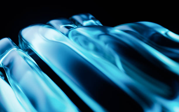istock Transparent wave glass geometries with colorful lights, 3d rendering. 2254987438