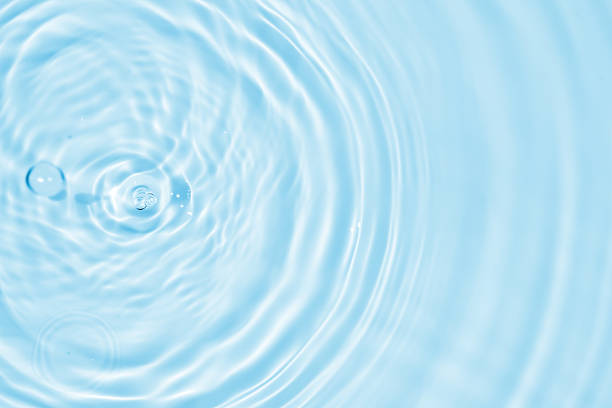 istock Abstract transparent water shadow surface texture natural ripple on blue background 2254988187