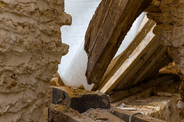 istock Aged timber beam and rough stone wall detail 2254989958