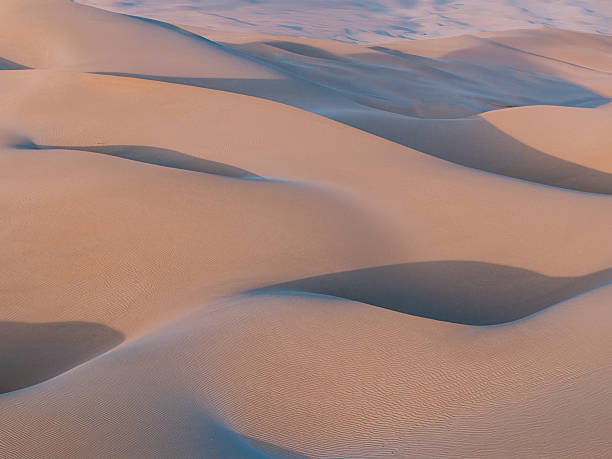 istock Soft Sand Dunes in the Xinjiang Desert, China 2254990439