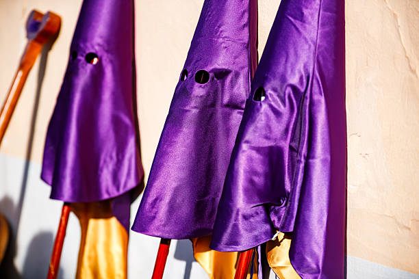 Purple Capirote Hoods Awaiting the Procession in Villajoyosa, Valencian Community, Spain