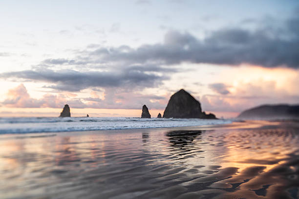 istock Sunset Reflecting at Haystack Rock Cannon Beach Oregon 2254999371