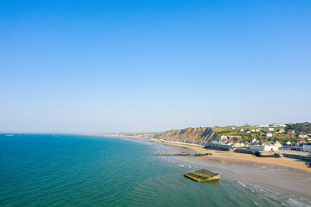 istock Blue sea and sandy coast at Arromanches-les-Bains 2255000480