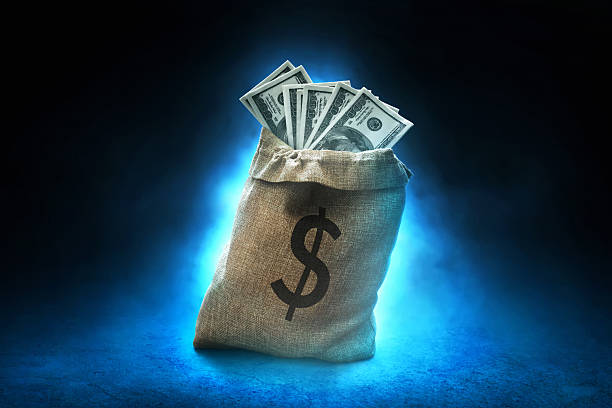 Money bag on dark background