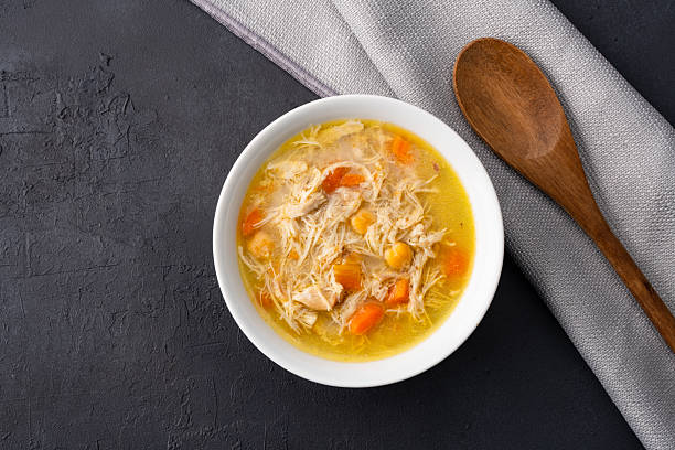 istock Delicious chicken soup with chickpeas served on an old black stone table. 2255011293