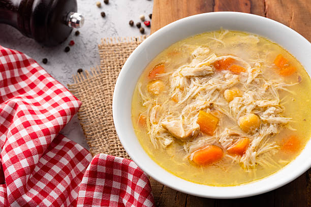 istock Delicious chicken soup with chickpeas served on an old stone table. 2255011313