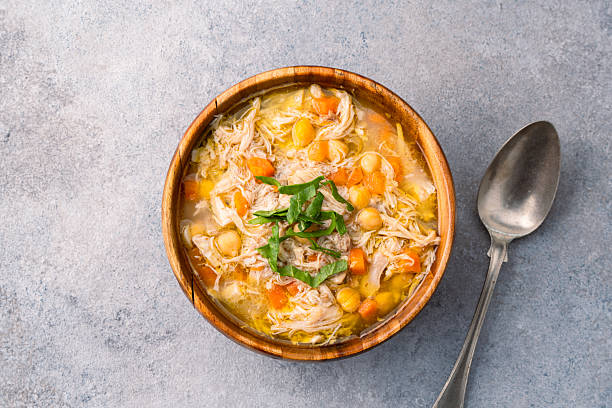 istock Delicious chicken soup with chickpeas served on an old stone table. 2255012456