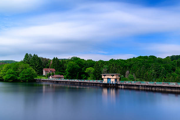 View of the Ronsdorf Dam and the surrounding landscape in autumn. Nature at the lake near Wuppertal. Saalbach Dam.
