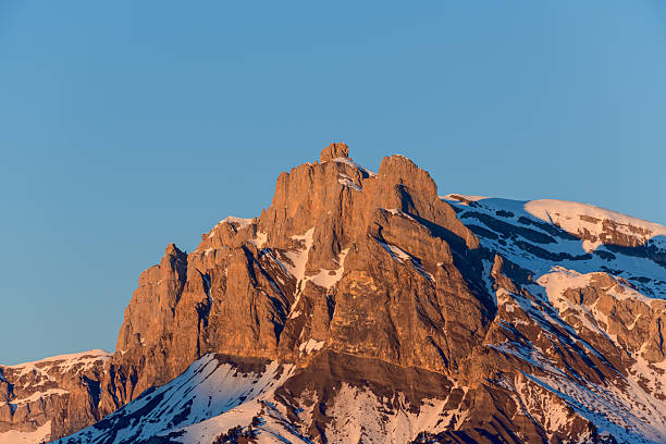 istock Golden hour light on Tete du Colonney summit 2255021414