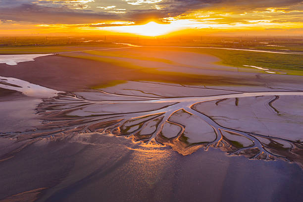 istock Beautiful sunset, wetland dried-up river, texture overlooking 2255021646