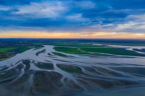 istock Beautiful sunset, wetland dried-up river, texture overlooking 2255021936