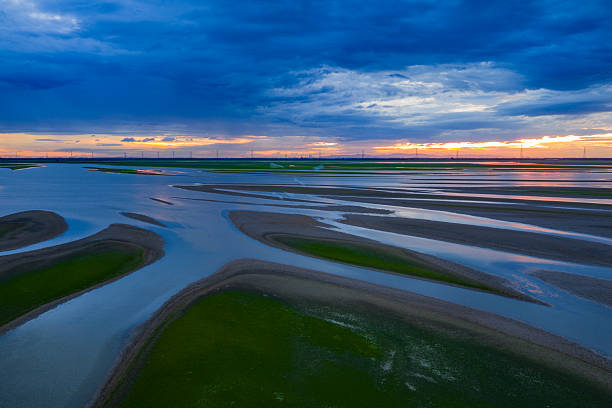 istock Beautiful sunset, wetland dried-up river, texture overlooking 2255022076