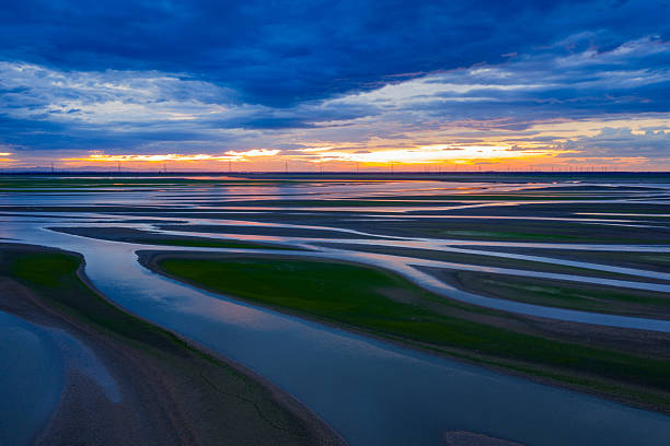 istock Beautiful sunset, wetland dried-up river, texture overlooking 2255022086