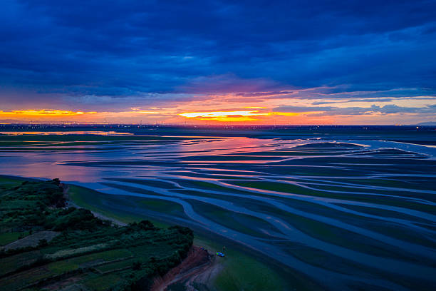 Beautiful sunset, wetland dried-up river, texture overlooking