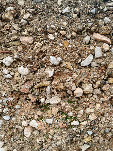 istock Rough Gravel and Stone Wall Texture Close-Up 2255030196