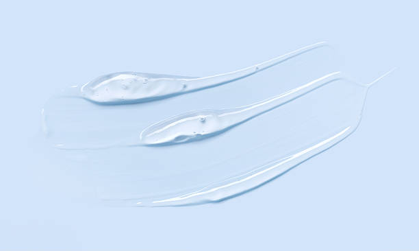 istock cosmetic texture gel essence on a blue background close-up 2255035053