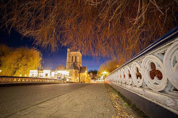 St Nicolas Parish Church at night view from Guildford Town Bridge Surrey England