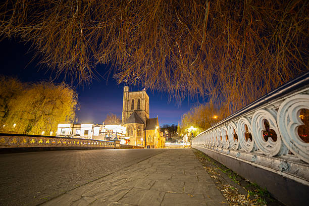 St Nicolas Parish Church at night view from Guildford Town Bridge Surrey England