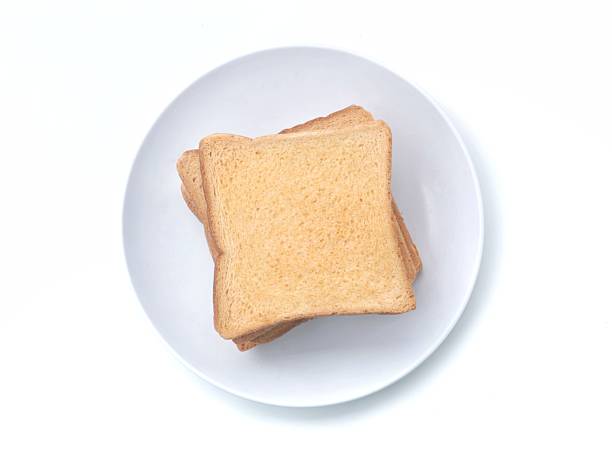 Delicious slices of toasted bread isolated on white
