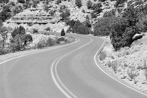 Road in Colorado National Monument in the United States. Part of National Park Service. Winding road.