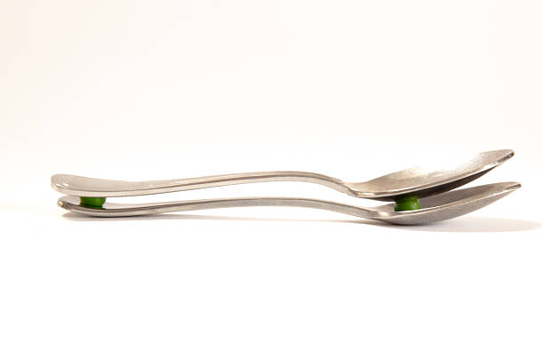 Old teaspoon isolated on white background.