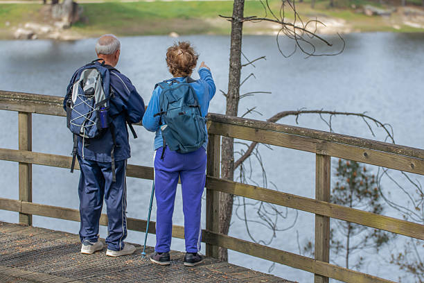 istock senior couple hiking outdoors in nature 2255044887