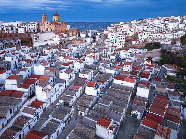 Aerial view of the white village of Pisticci with traditional houses and narrow alleys, Matera province, Basilicata, South of Italy, Italy