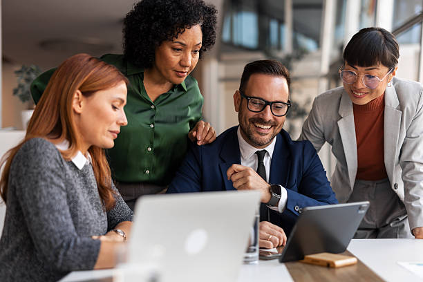 istock Diverse business team collaborating on project in modern office 2255058580