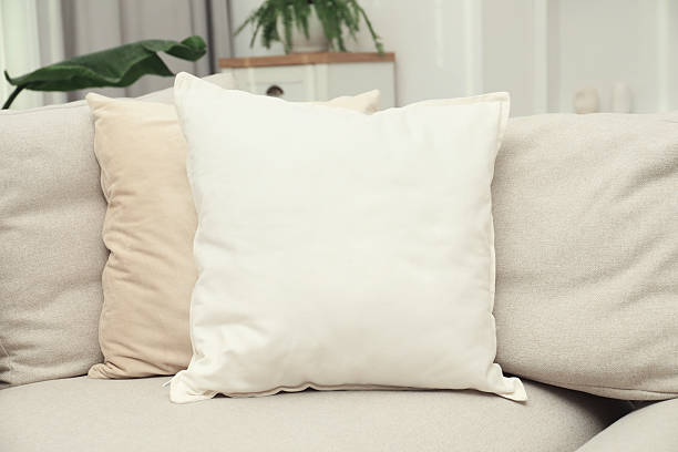 istock Blank soft pillow on cozy couch indoors 2255067550