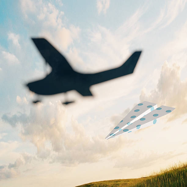 istock Paper Airplane Shadow Becomes Small Aircraft 2255071485