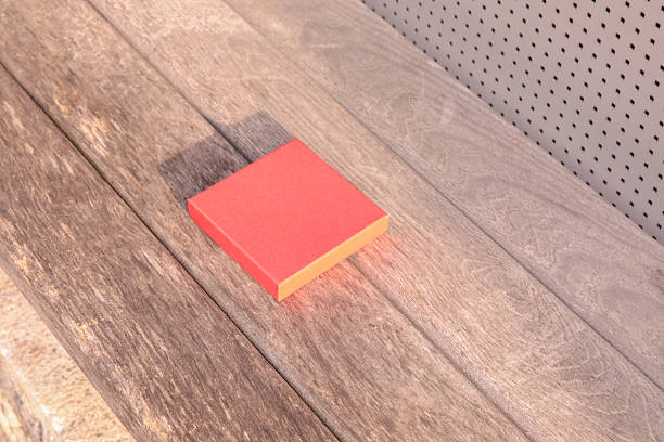 Red book on wooden table