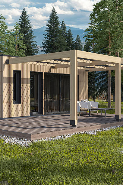 istock Scandinavian Modern Villa or Weekend House with Pine Wood Paneling Facade and Canopy 2255079143