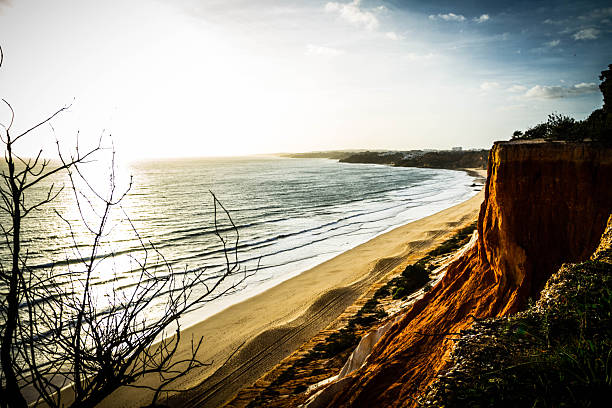 A raging sea crashes with its waves on the rocks that cross its path