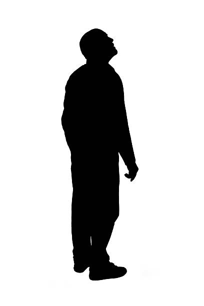 istock silhouette of  back side view of a man looking up 2255085840