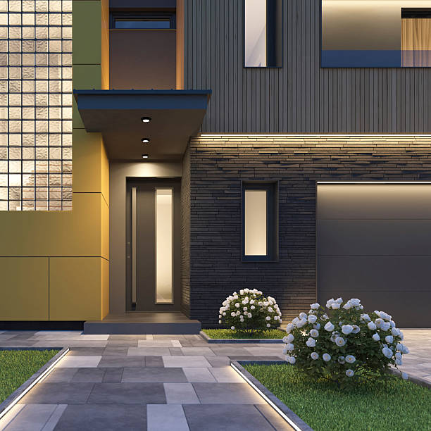 istock Modern Luxury Two-story Villa with garage and with Illuminated Pathway at Dusk 2255085933