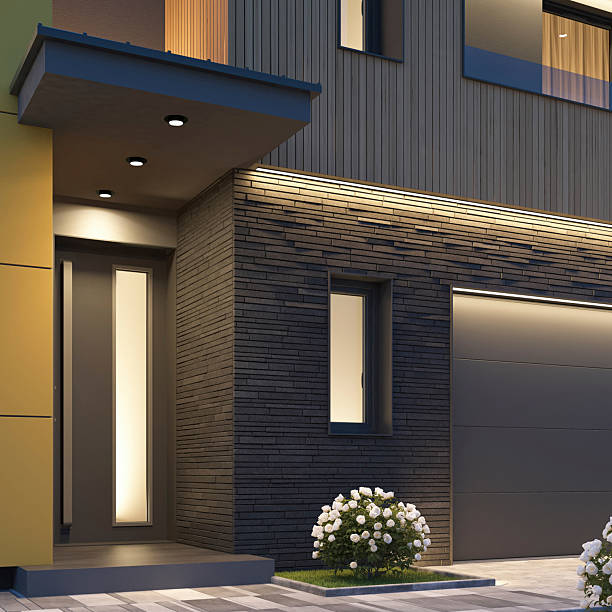 istock Modern Luxury Two-story Villa with garage and with Illuminated Pathway at Dusk 2255086134