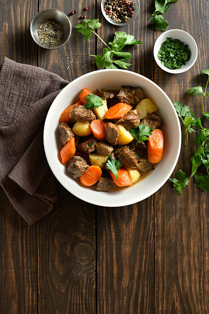 Beef meat stewed with potatoes, carrots and spices