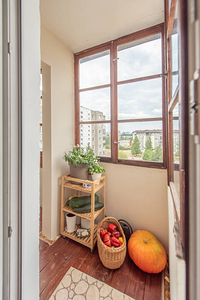 istock Enclosed Balcony with Panoramic Apartment View and Wooden Flooring 2255096497