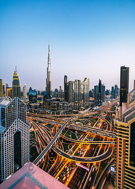 istock Dubai Skyline Over Busy Highway Interchange At Dusk 2255105506