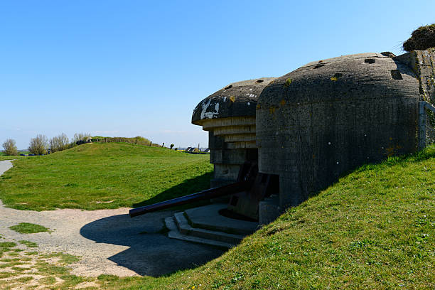 istock Historic WWII bunker on grassy Normandy hillside 2255109829