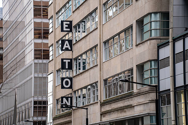 A landmark structure of British cultural and architectural heritage: The Freemasons Hall (located at 60 Great Queen Street, WC2B 5AZ; constructed between 1927 and 1933), Art Deco architecture with street lights mounted on the Portland stone facade and positioned along the pavement and rich ornamentation incorporating Masonic symbols and geometric forms on Great Queen Street in Covent Garden, Central London, England, UK.