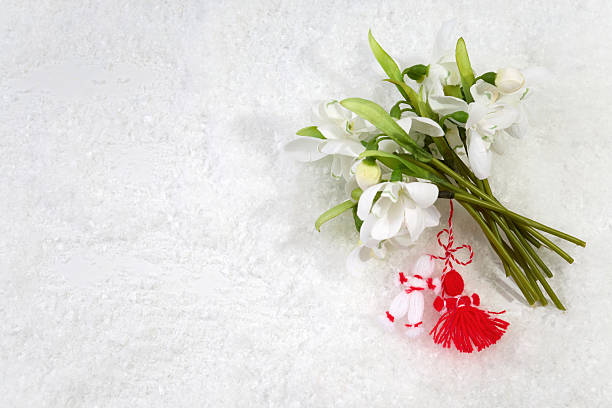 Snowdrops and martisor charms symbolizing spring's arrival and the end of winter