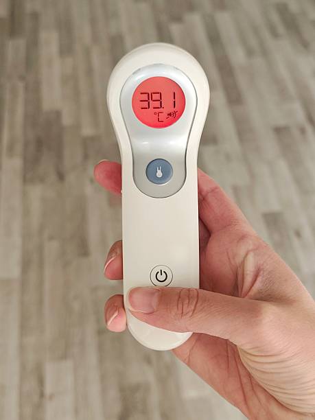 istock Digital thermometer showing fever on the display 2255113647