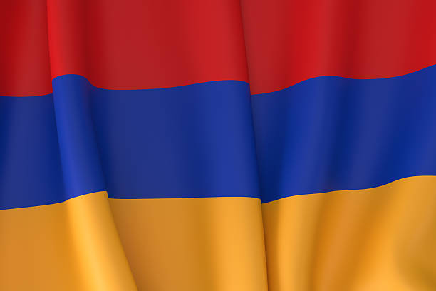 Small paper flag of Armenia pinned. Isolated on white background. Horizontal orientation. Close up photography. Copy space.