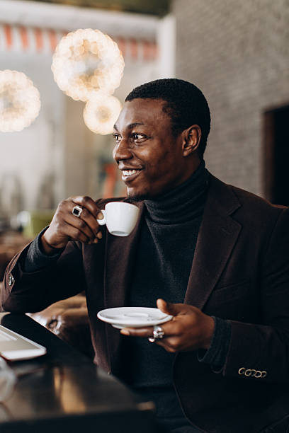 istock African American man enjoying coffee break in cafe 2255117573