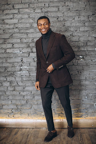istock Smiling young man posing in business casual attire 2255117733