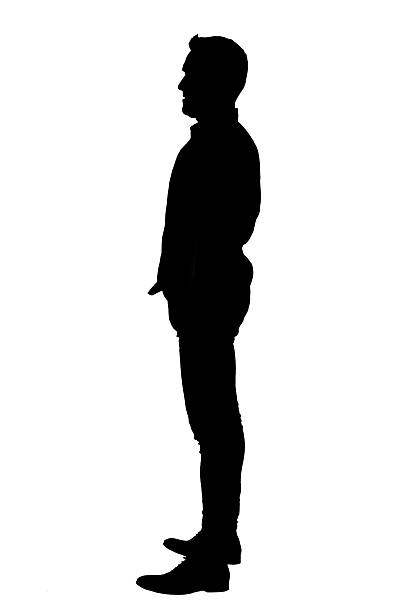 istock silhouette of a side view of a cool man standing on white background 2255119443